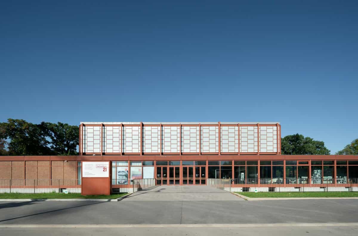 Modern building with glass facade and clear sky